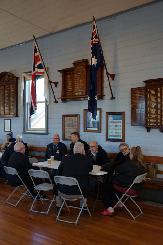 Warming up with a cuppa under the Honour Boards in the Toongabbie Mechanics Hall.